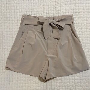Athleta High Waist Tan Shorts with Bow (missing one fastener, shown in pics)